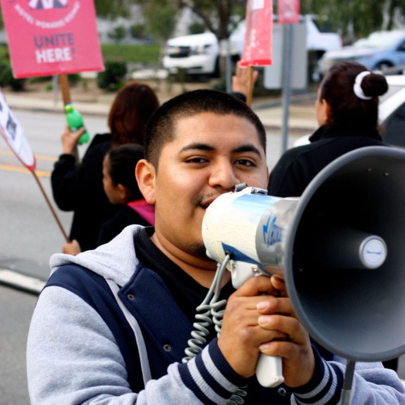 labor organizer with megaphone